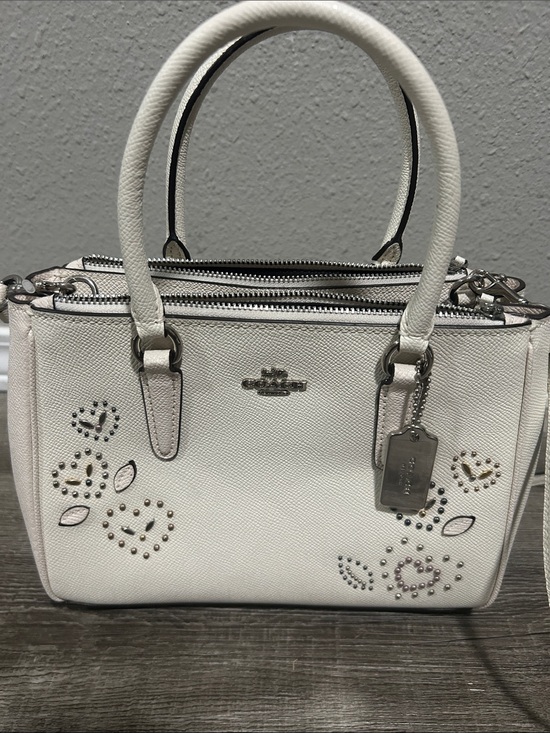 Coach Handbags - Coach White Studded Heart Satchel 9”L x 7”H